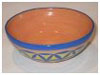 A Bali stoneware small bowl, decorated with blue geomatric design on yellow background  - second view..